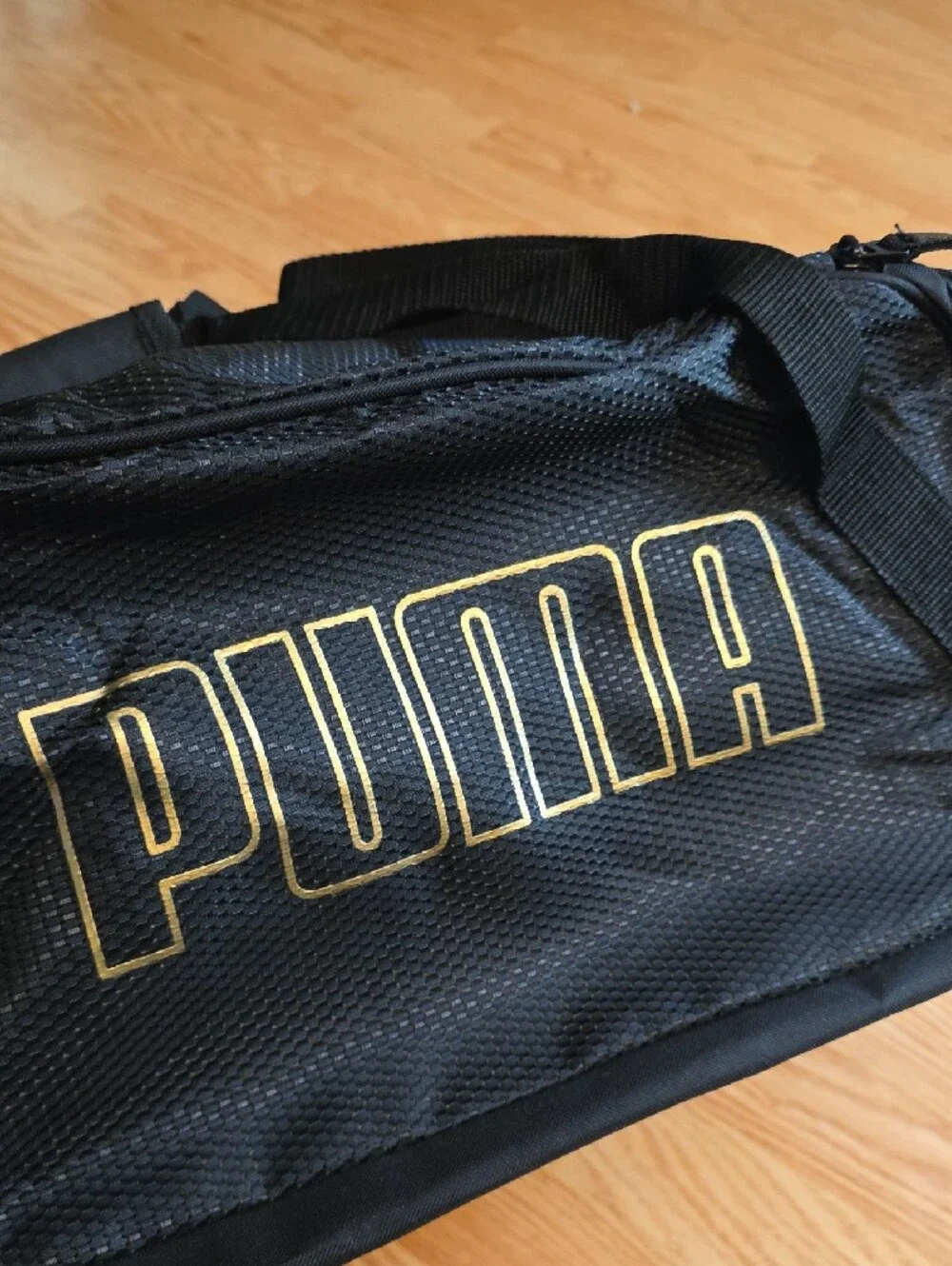 Puma Black Duffel with Gold Puma Logo